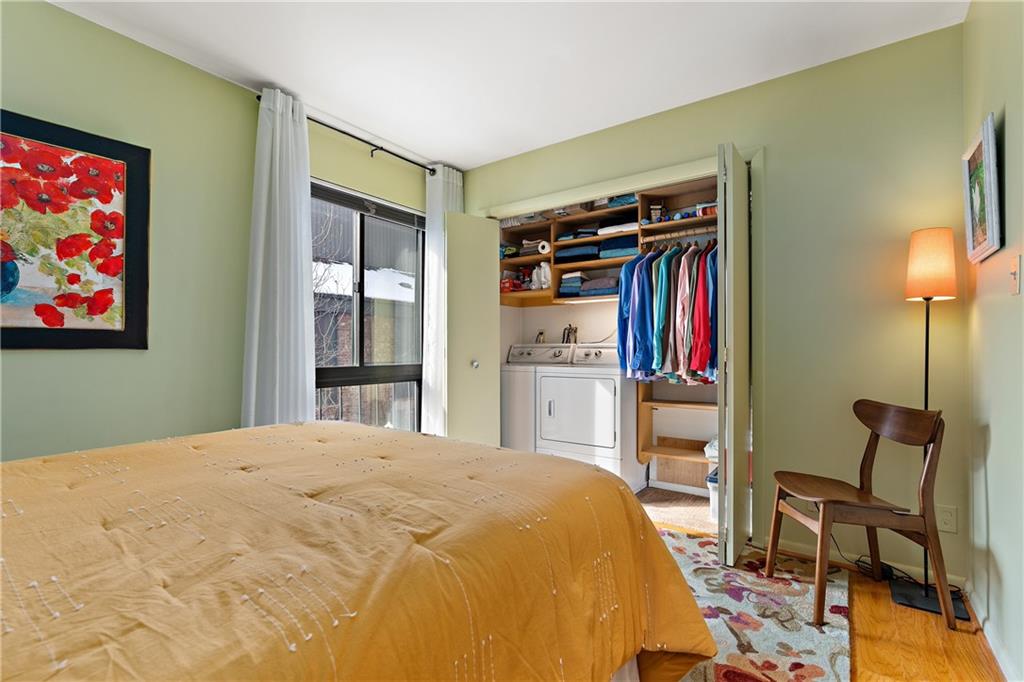 7 Foster Square Pittsburgh, PA 15212 - Photo 15 of 22 a bed room with a bed and a chair