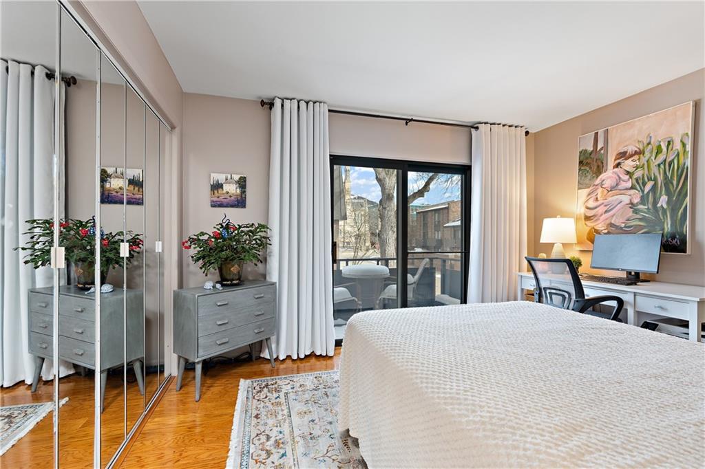 7 Foster Square Pittsburgh, PA 15212 - Photo 18 of 22 a bedroom with a bed and a window