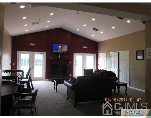 1023 Edpas Road New Brunswick, NJ 08901 - Photo 9 of 10 a living room with furniture a air conditioner and a window
