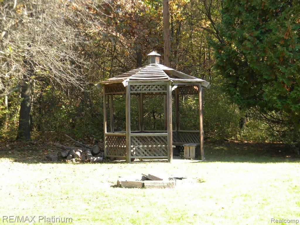 750 Henderson Road Howell, MI 48855 - Photo 23 of 25 Gazebo and Fire Pit