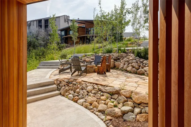 a view of a balcony with furniture