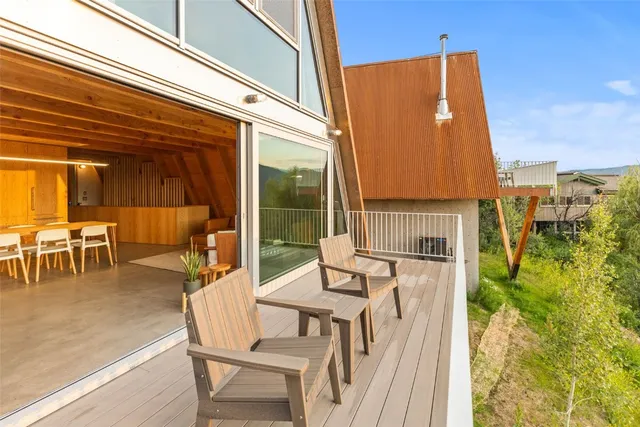 a view of a dining room and chairs