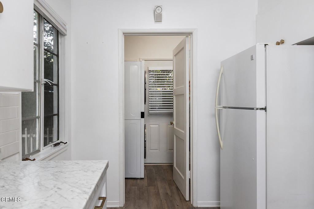 1070 East Woodbury Road Pasadena, CA 91104 - Photo 16 of 28 a view of hallway with wooden floor