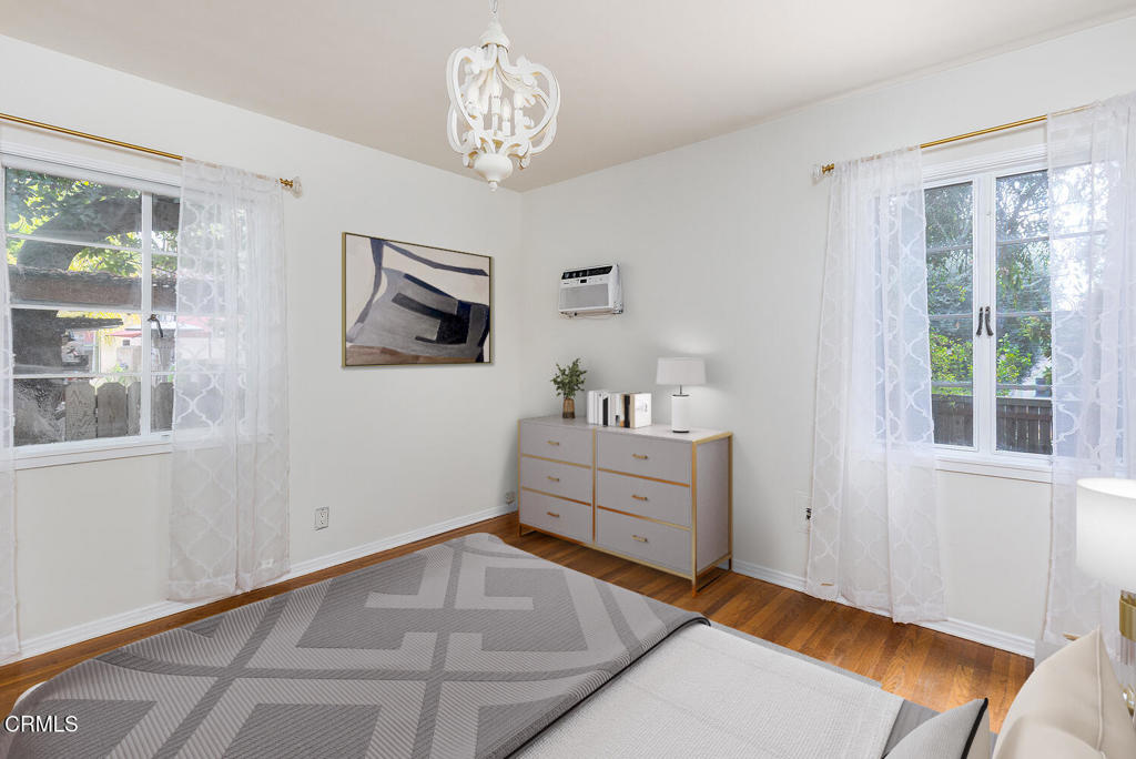 1070 East Woodbury Road Pasadena, CA 91104 - Photo 18 of 28 a room with furniture and window