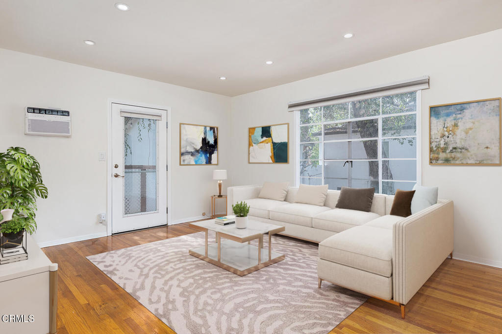 1070 East Woodbury Road Pasadena, CA 91104 - Photo 5 of 28 a living room with furniture and wooden floor