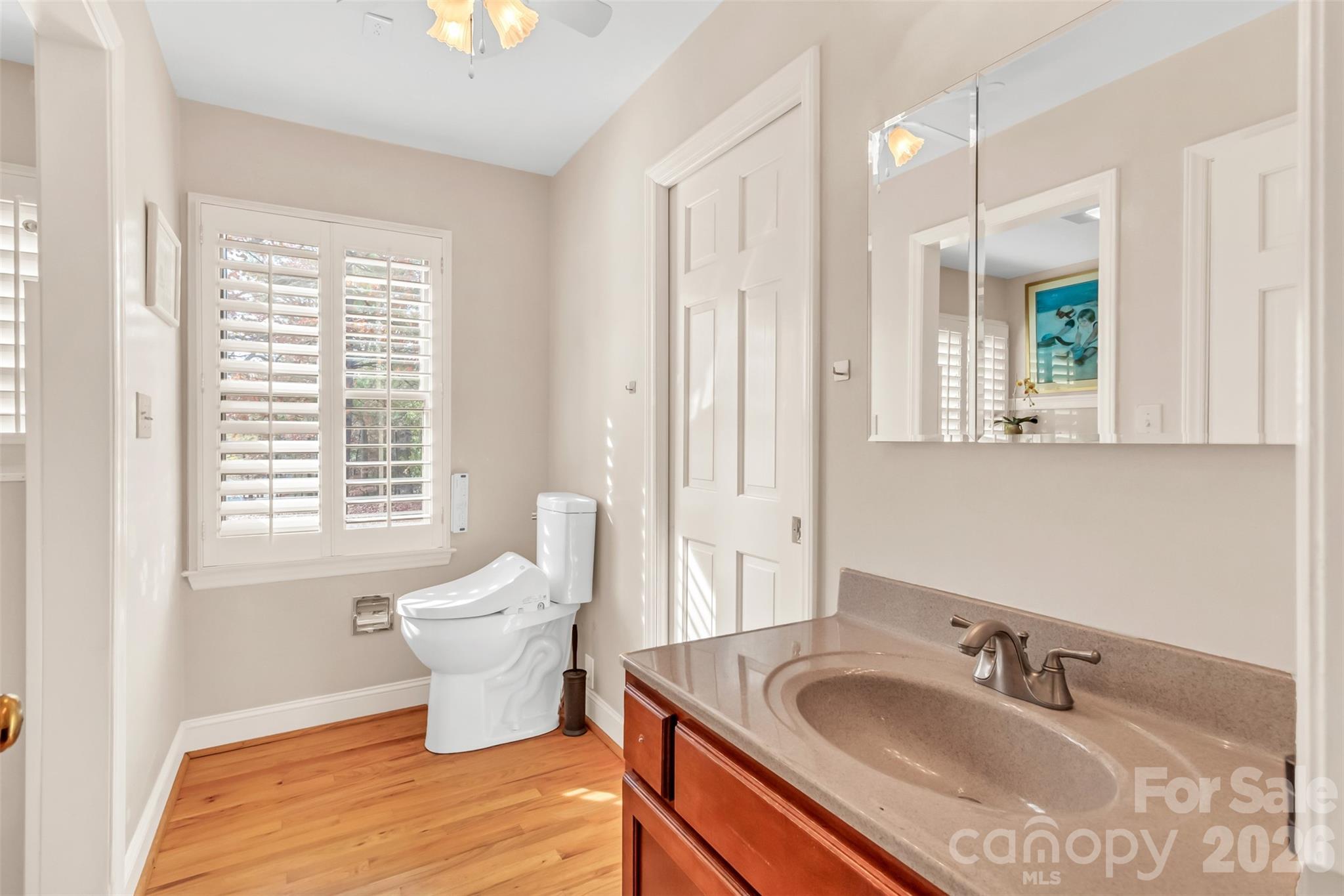 3 Lake Ridge Road Clover, SC 29710 - Photo 26 of 41 a bathroom with a sink and a large mirror