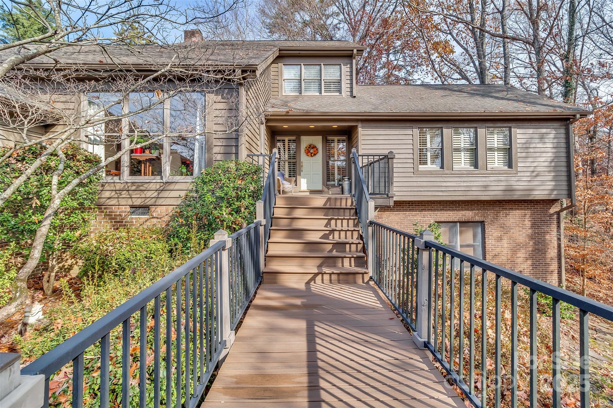 3 Lake Ridge Road Clover, SC 29710 - Photo 9 of 41 a view of a balcony with wooden floor and fence