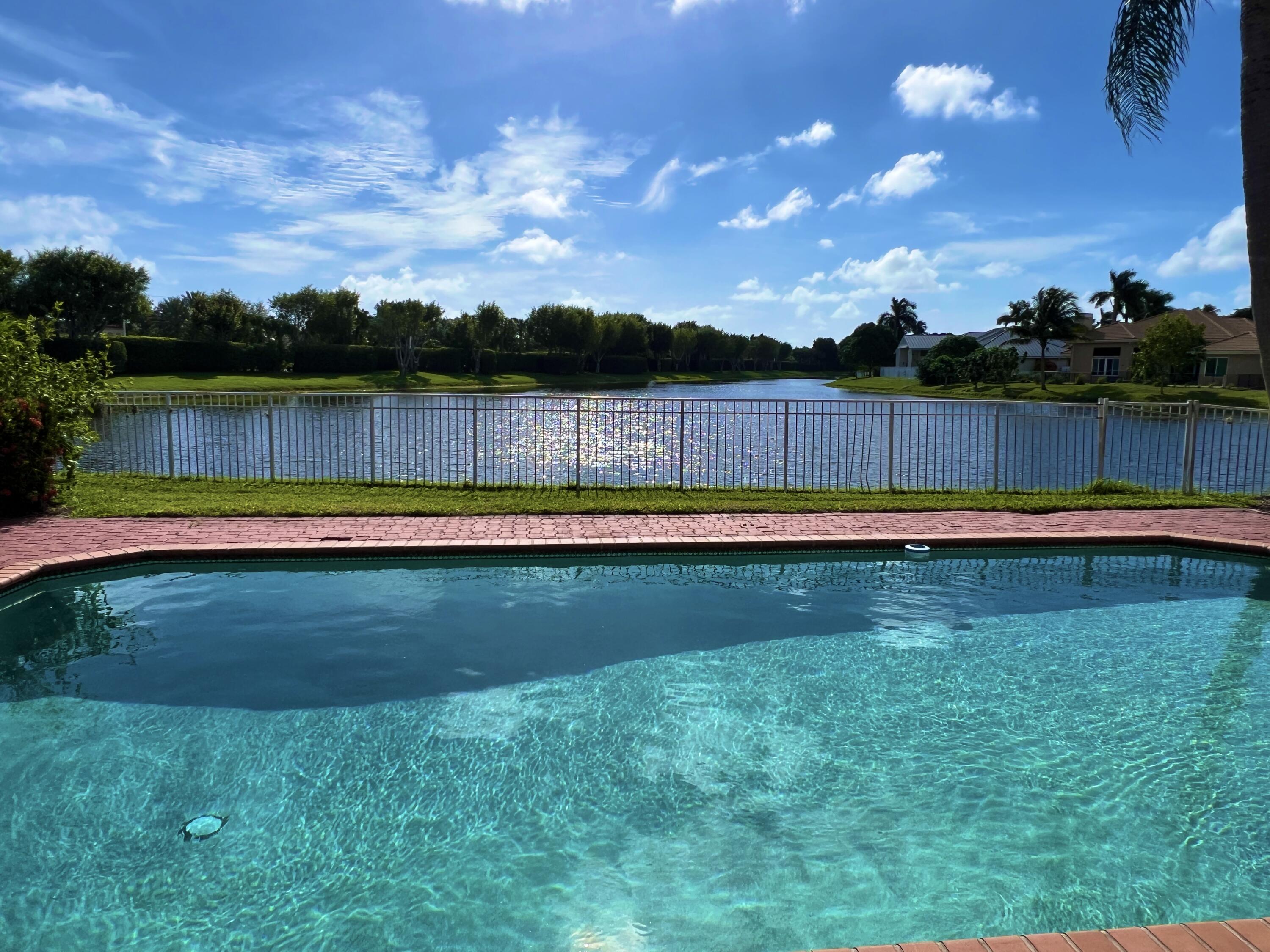 17264 Hampton Boulevard Boca Raton, FL 33496 - Photo 2 of 72 Pool & Lake View