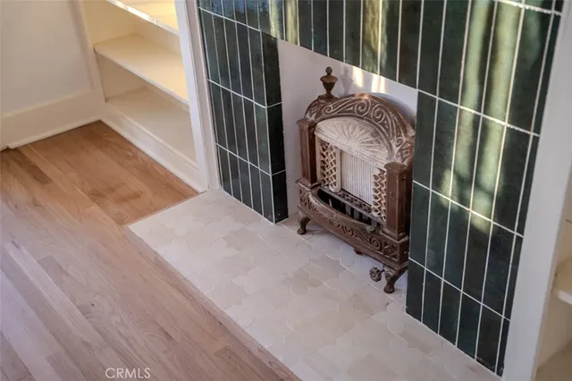 a view of kitchen with sink and wooden floor