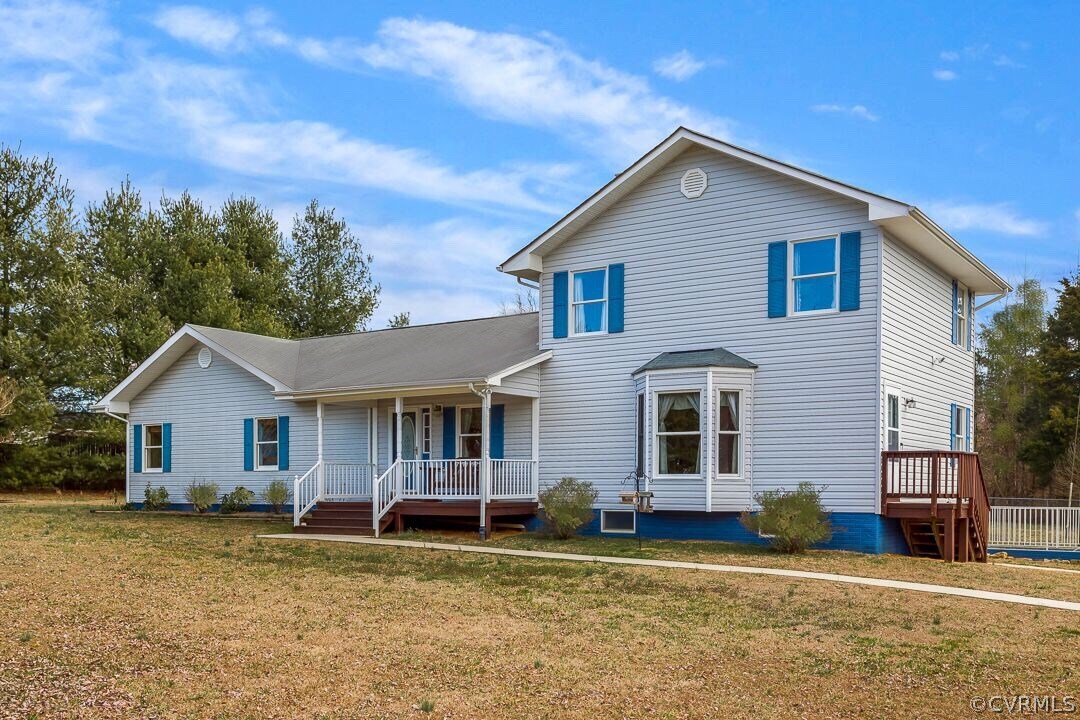 8338 Marye Road Partlow, VA 22534 - Photo 2 of 32 a front view of a house with a yard