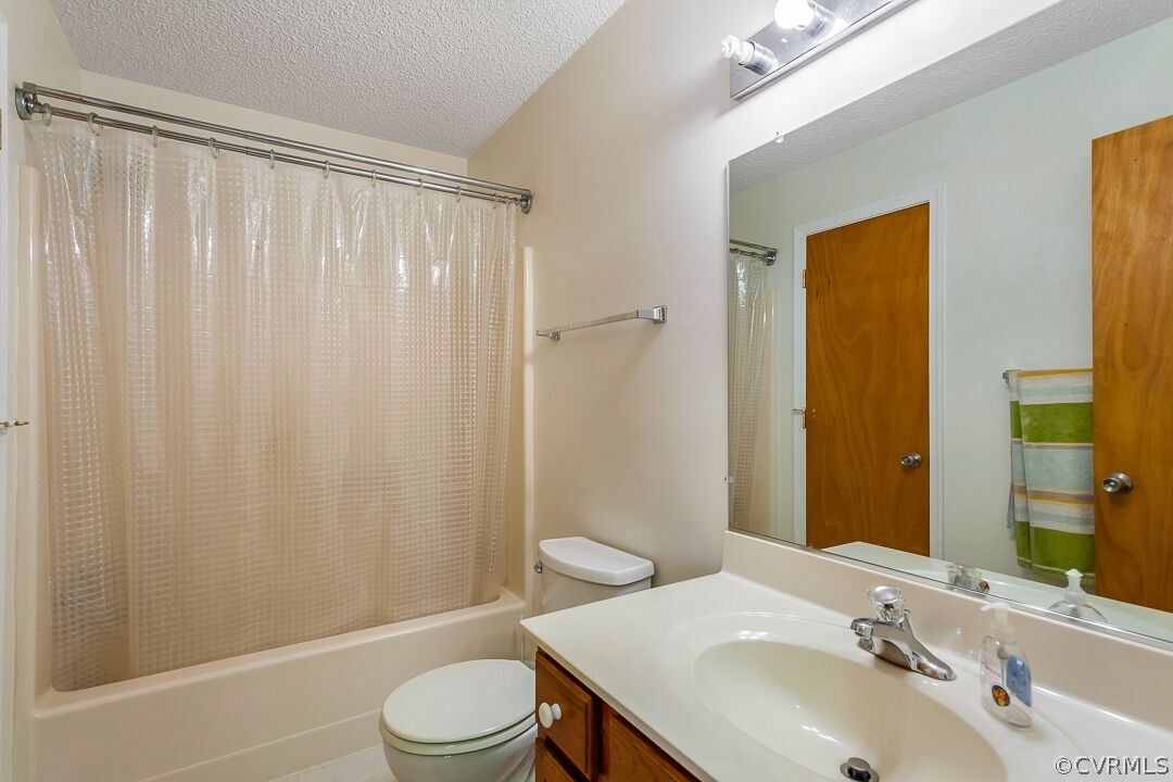 8338 Marye Road Partlow, VA 22534 - Photo 21 of 32 a bathroom with a sink toilet and shower