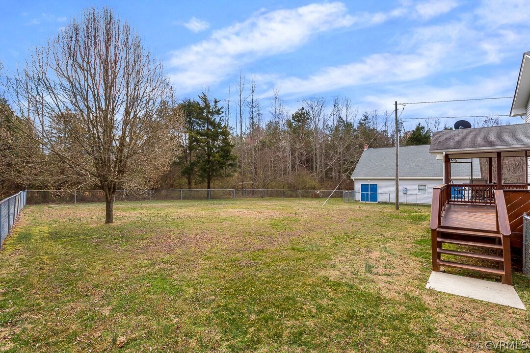 8338 Marye Road Partlow, VA 22534 - Photo 27 of 32 a backyard of a house with lots of green space
