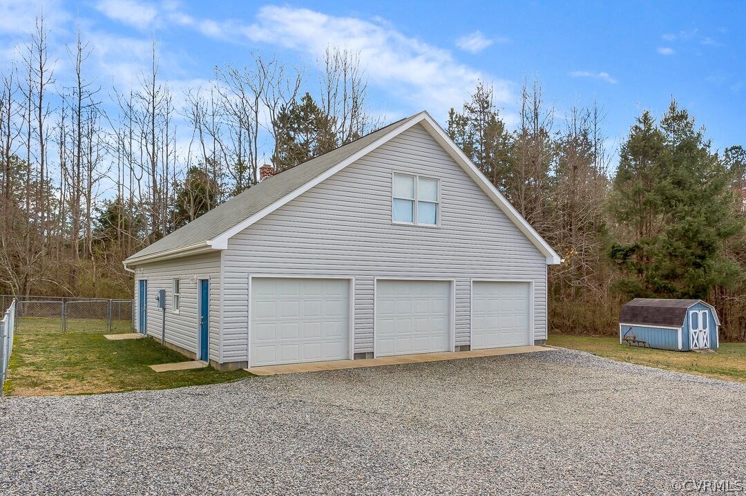 8338 Marye Road Partlow, VA 22534 - Photo 28 of 32 a view of a house with a yard and garage