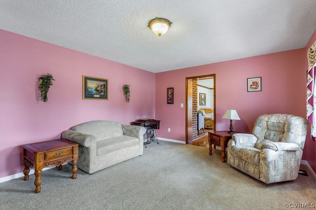8338 Marye Road Partlow, VA 22534 - Photo 6 of 32 a living room with furniture and a window