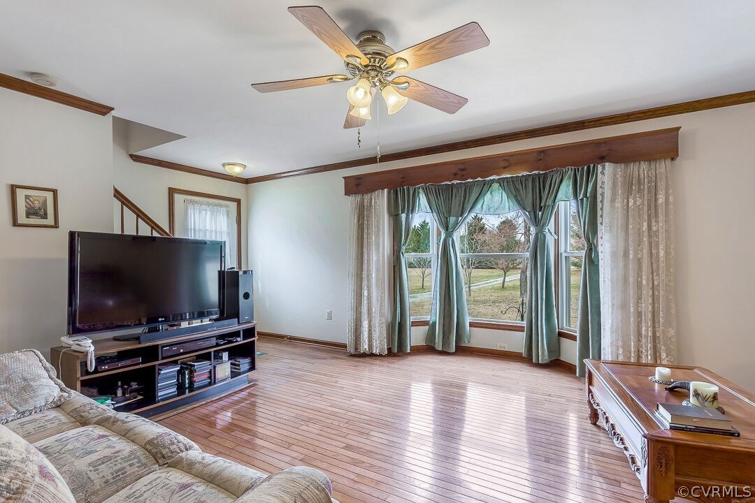 8338 Marye Road Partlow, VA 22534 - Photo 10 of 32 a living room with furniture and a flat screen tv
