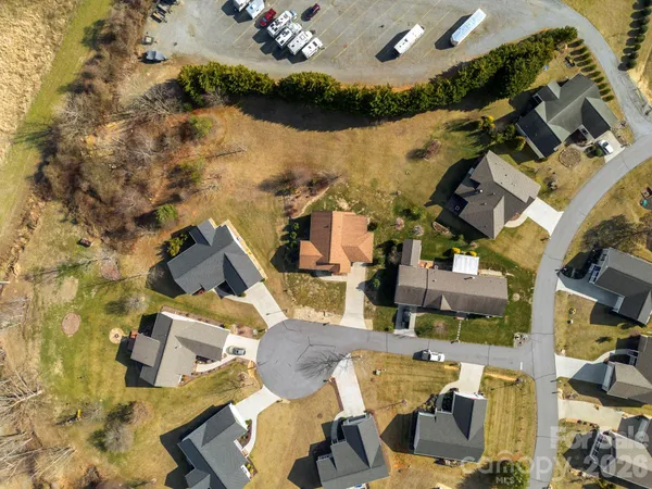 an aerial view of a houses with outdoor space