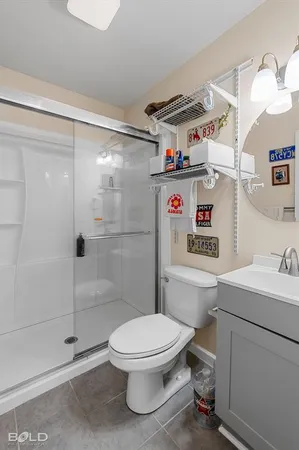 a bathroom with a toilet a sink and bathtub