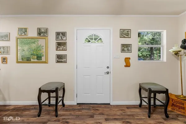 a view of a livingroom with furniture and window