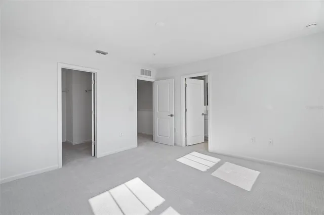 a view of a room with racks on the wall