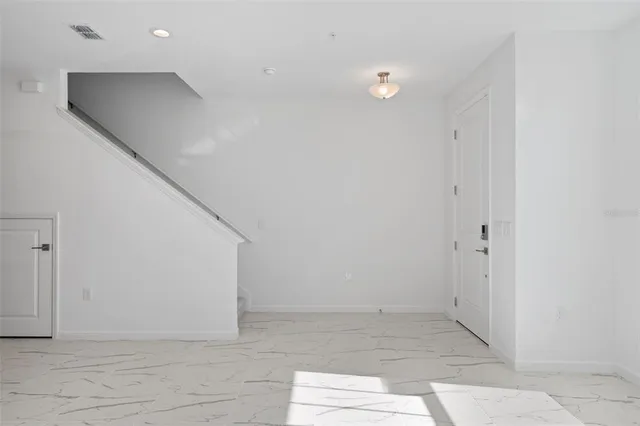 a bathroom with a sink a mirror and a toilet