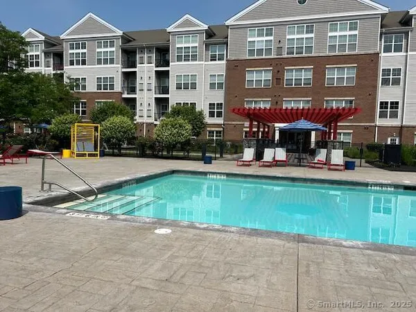 a front view of a building with garden