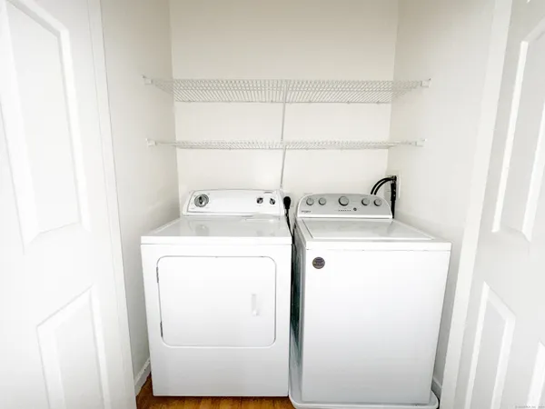 a utility room with dryer and washer