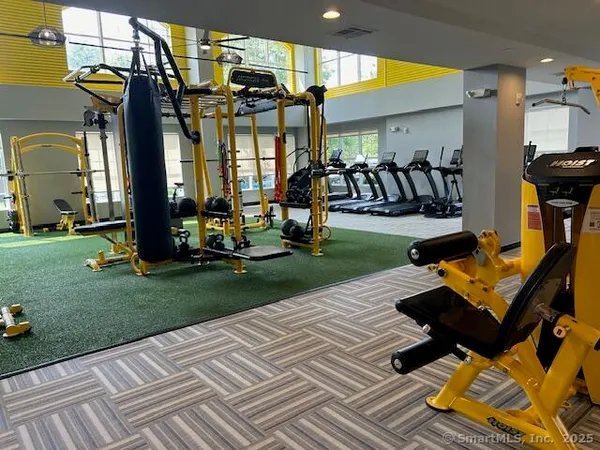 a view of a house with backyard floor and sitting area