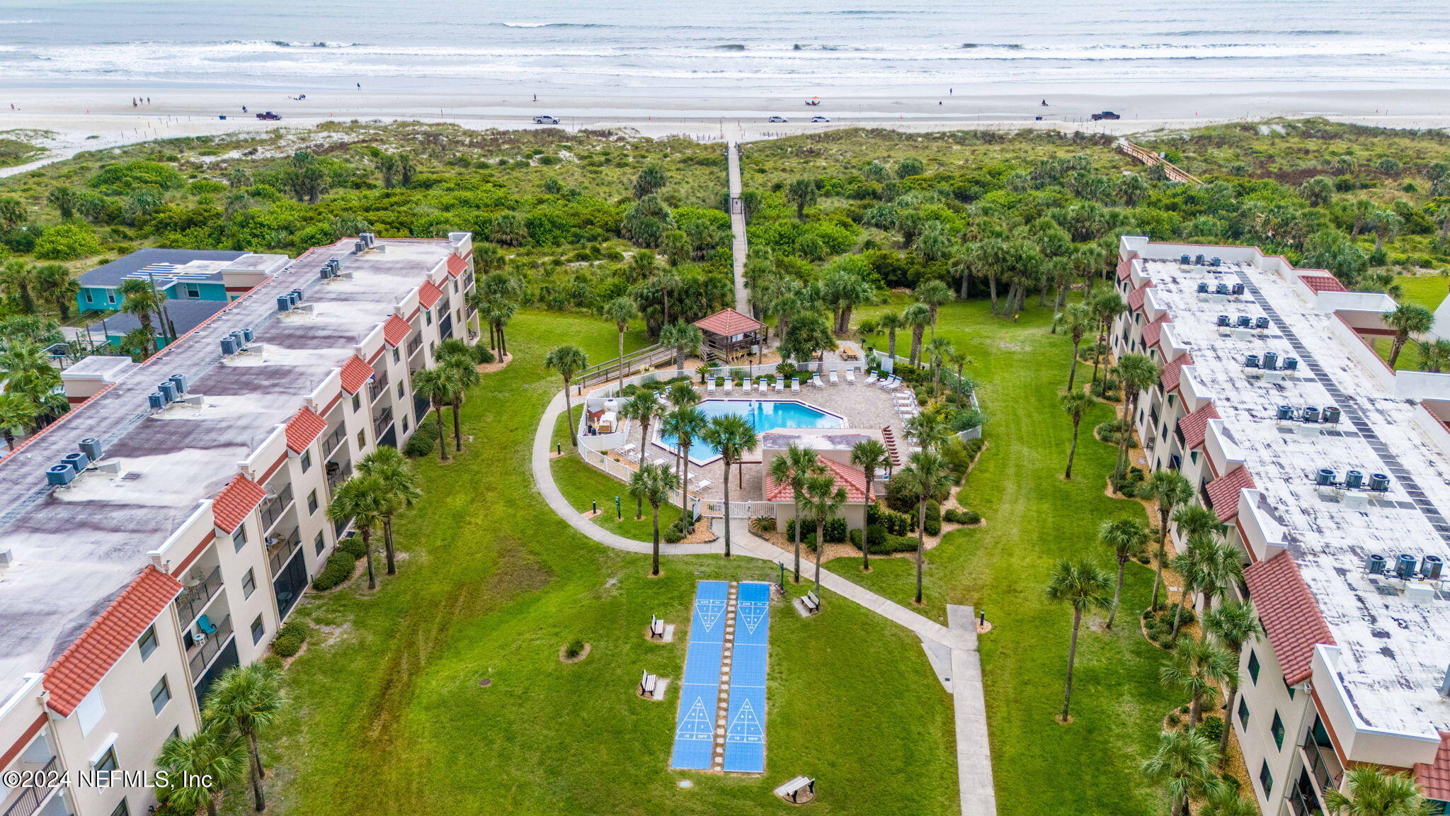 4250 Florida A1A, Unit M35 St. Augustine, FL 32080 - Photo 34 of 57 a view of a swimming pool with a patio