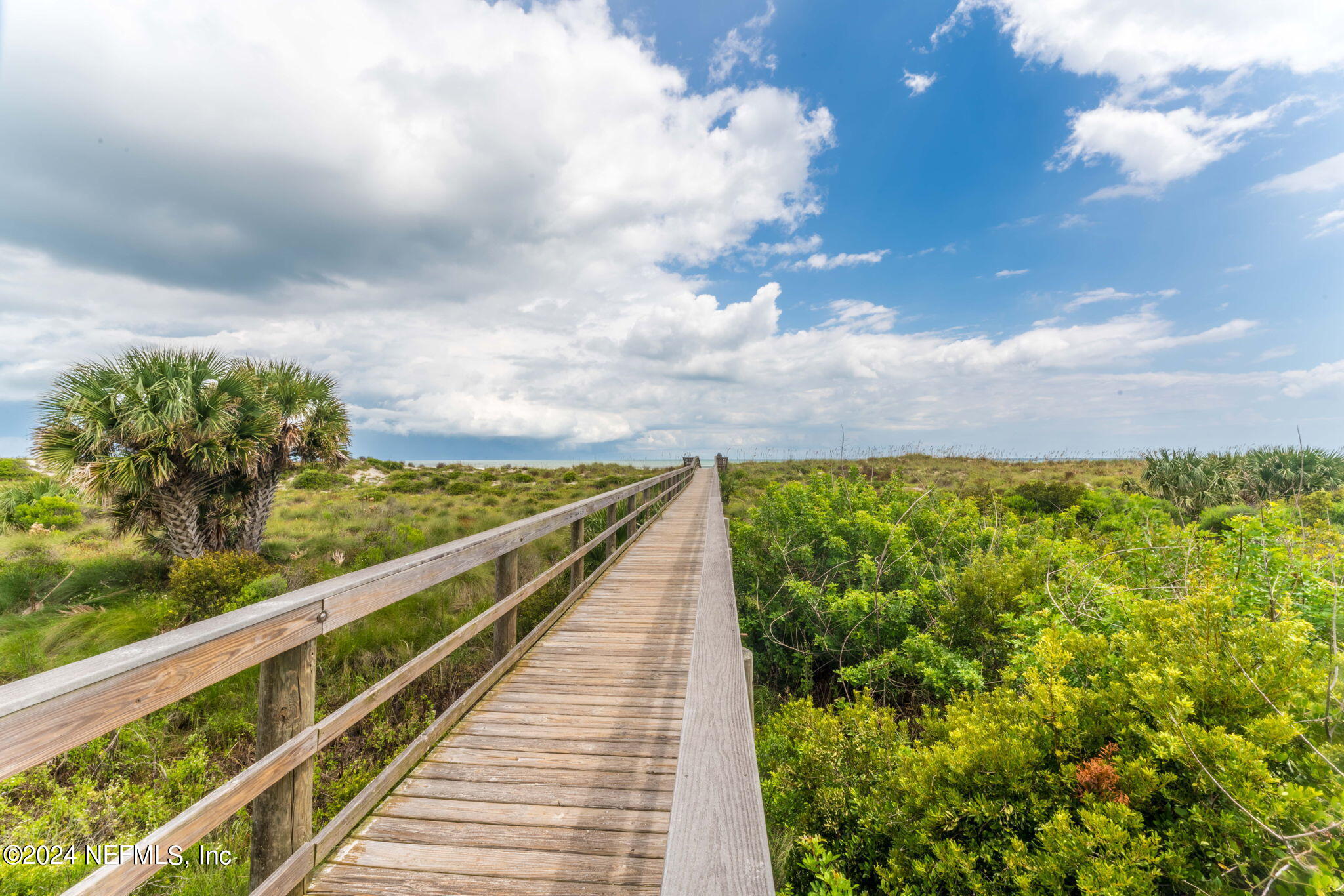 4250 Florida A1A, Unit M35 St. Augustine, FL 32080 - Photo 49 of 57 a view of a balcony with an outdoor seating