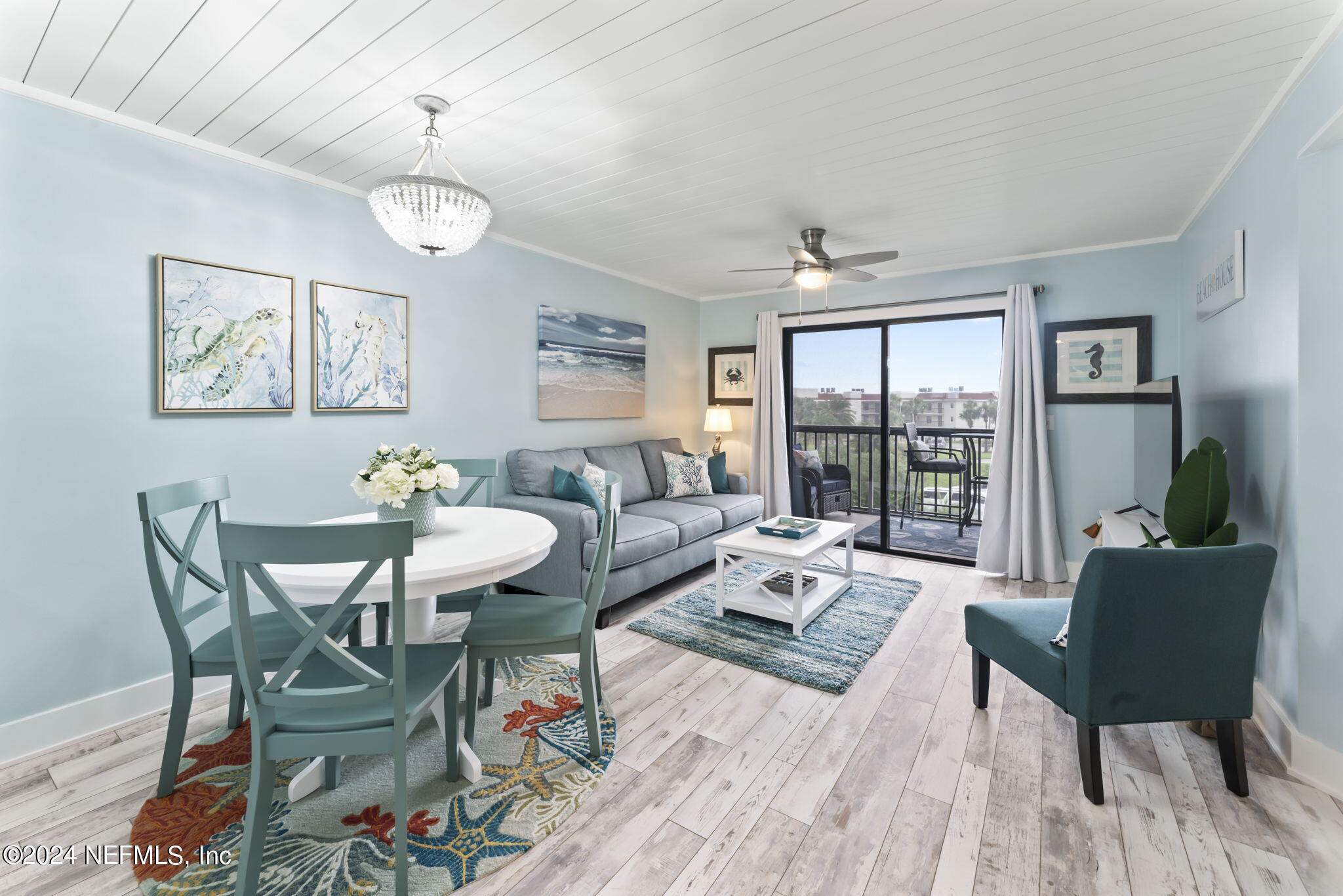 4250 Florida A1A, Unit M35 St. Augustine, FL 32080 - Photo 8 of 57 a living room with furniture and a large window