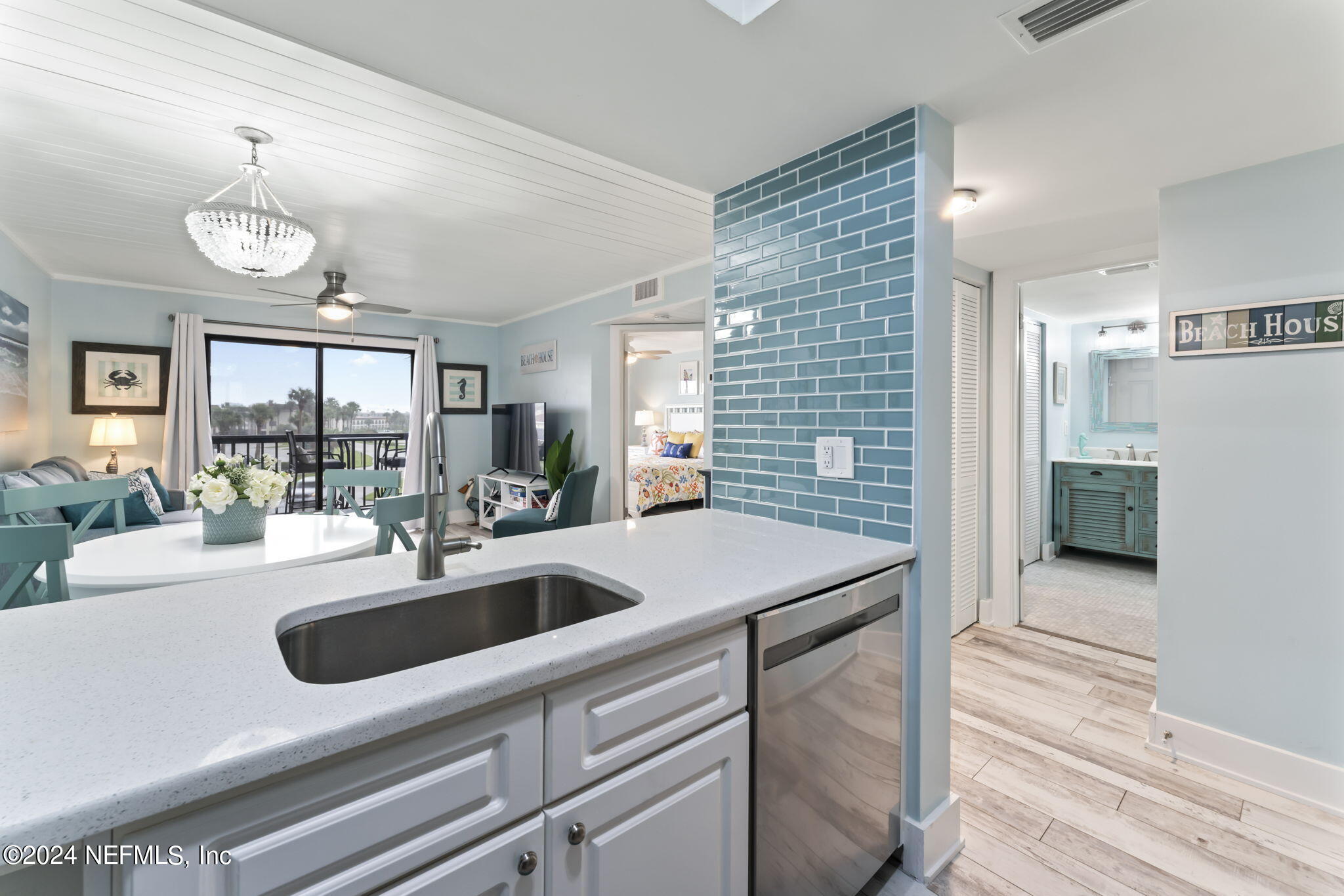 4250 Florida A1A, Unit M35 St. Augustine, FL 32080 - Photo 9 of 57 a kitchen with a sink and refrigerator