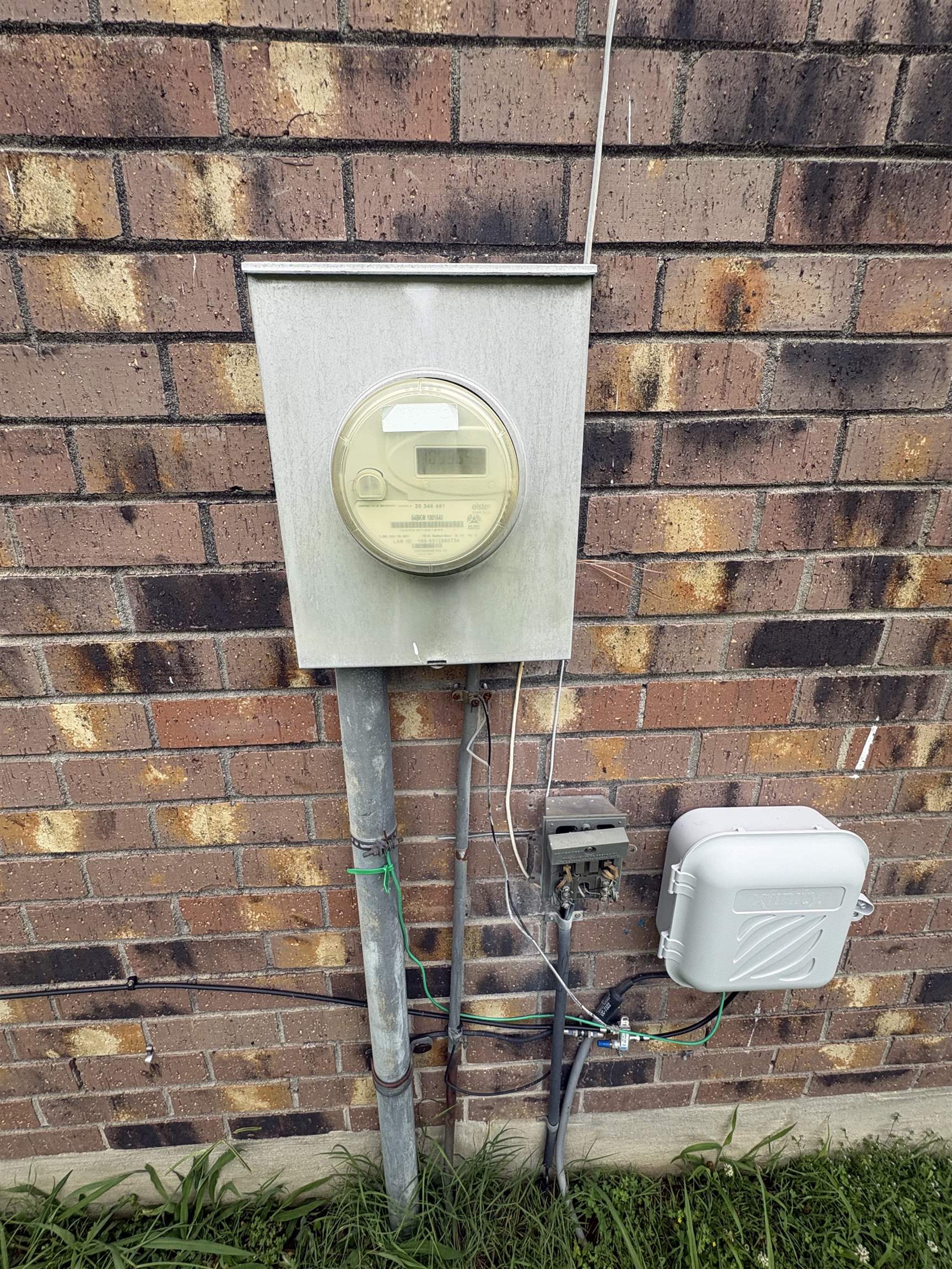 4585 Double Tree Street Memphis, TN 38109 - Photo 3 of 10 Brick exterior facade with electrical meter and conduit
