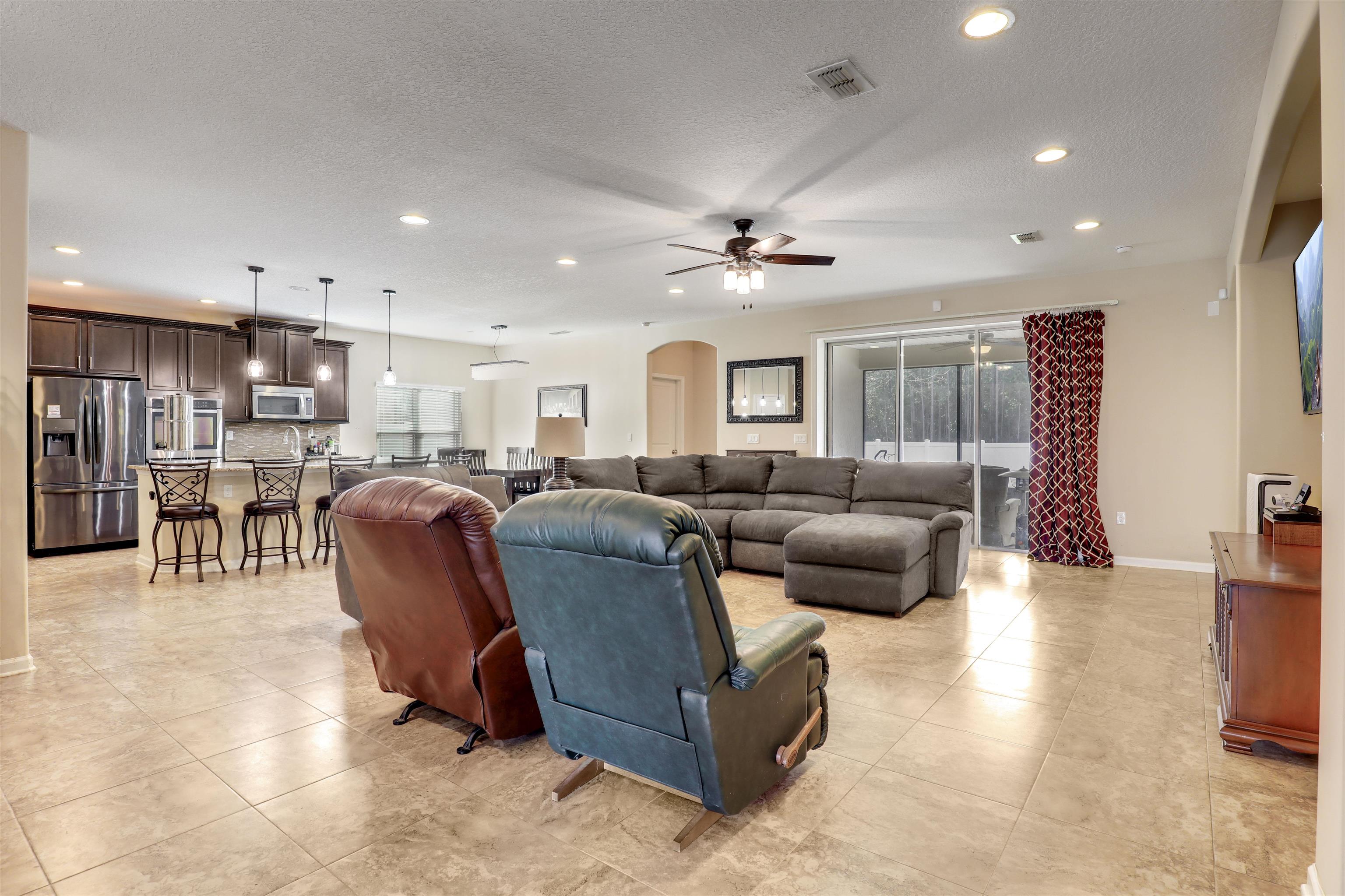 200 Ellsworth Circle St. Johns, FL 32259 - Photo 14 of 58 a living room with furniture and a view of kitchen