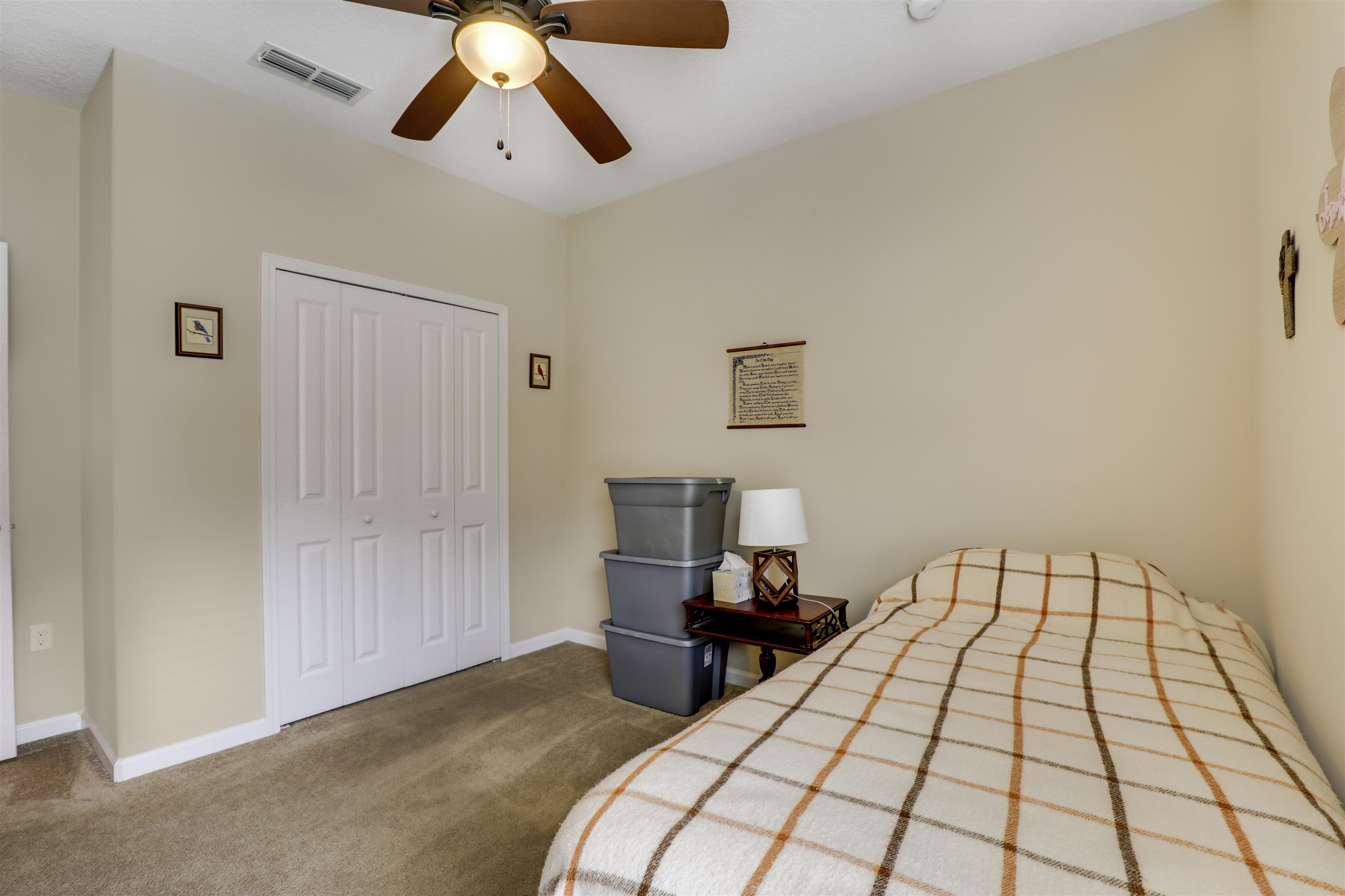 200 Ellsworth Circle St. Johns, FL 32259 - Photo 24 of 58 a bed room with a bed and painting on the wall