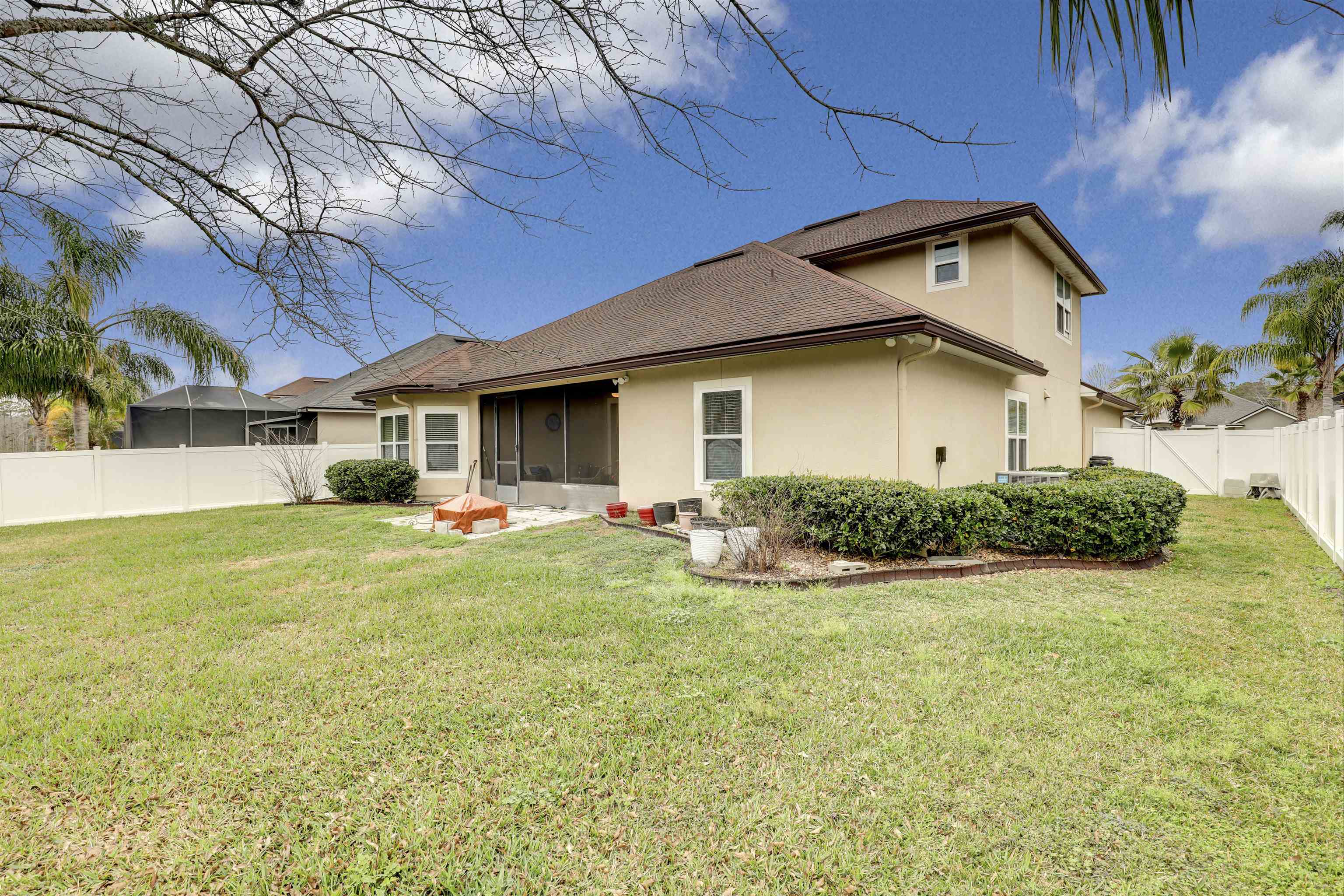 200 Ellsworth Circle St. Johns, FL 32259 - Photo 39 of 58 a front view of house with an outdoor space and seating