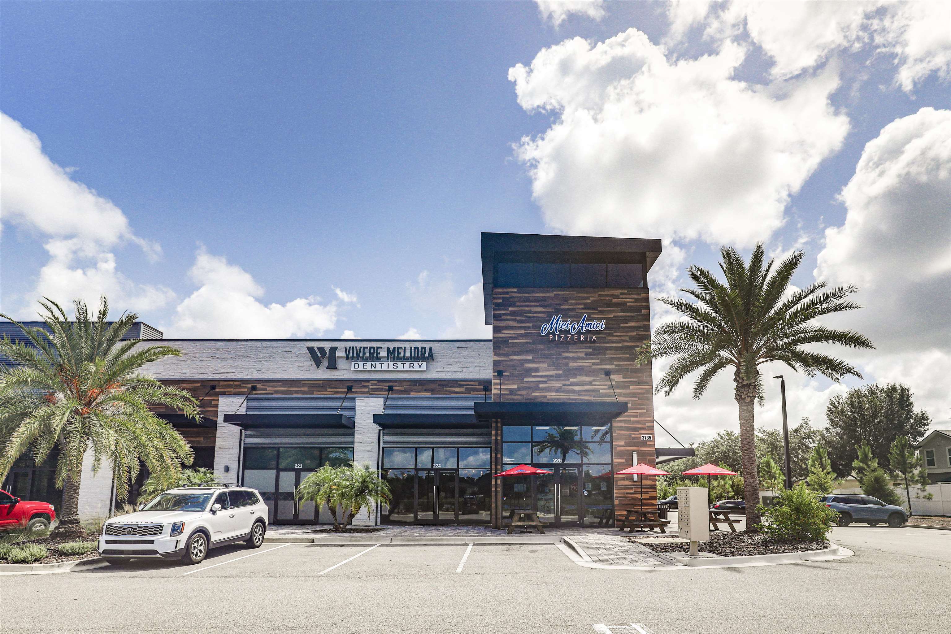 200 Ellsworth Circle St. Johns, FL 32259 - Photo 43 of 58 a group of cars parked in front of a building