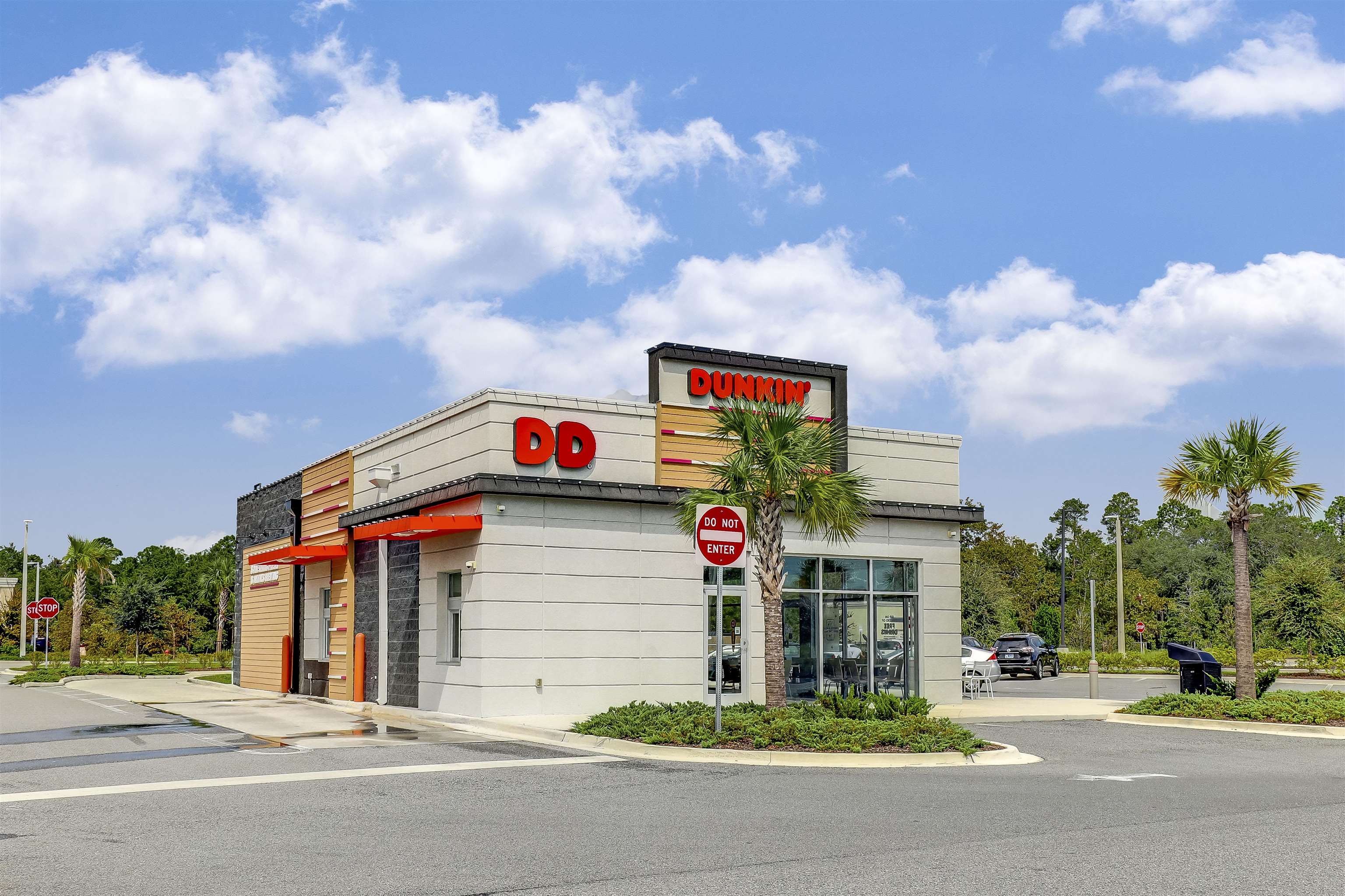 200 Ellsworth Circle St. Johns, FL 32259 - Photo 50 of 58 a front view of multi story residential apartment building with garage and trees