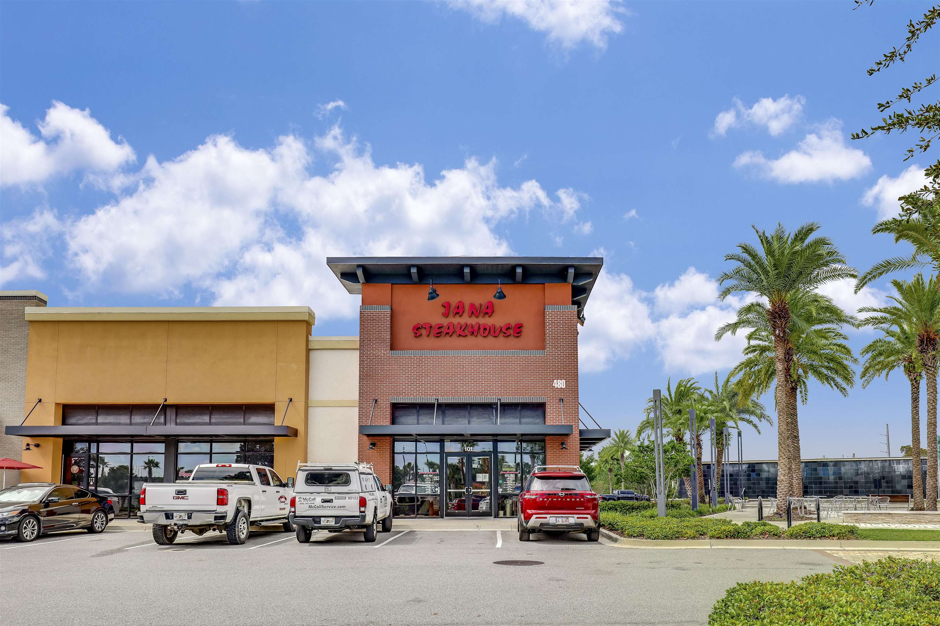 200 Ellsworth Circle St. Johns, FL 32259 - Photo 57 of 58 a cars parked in front of a building