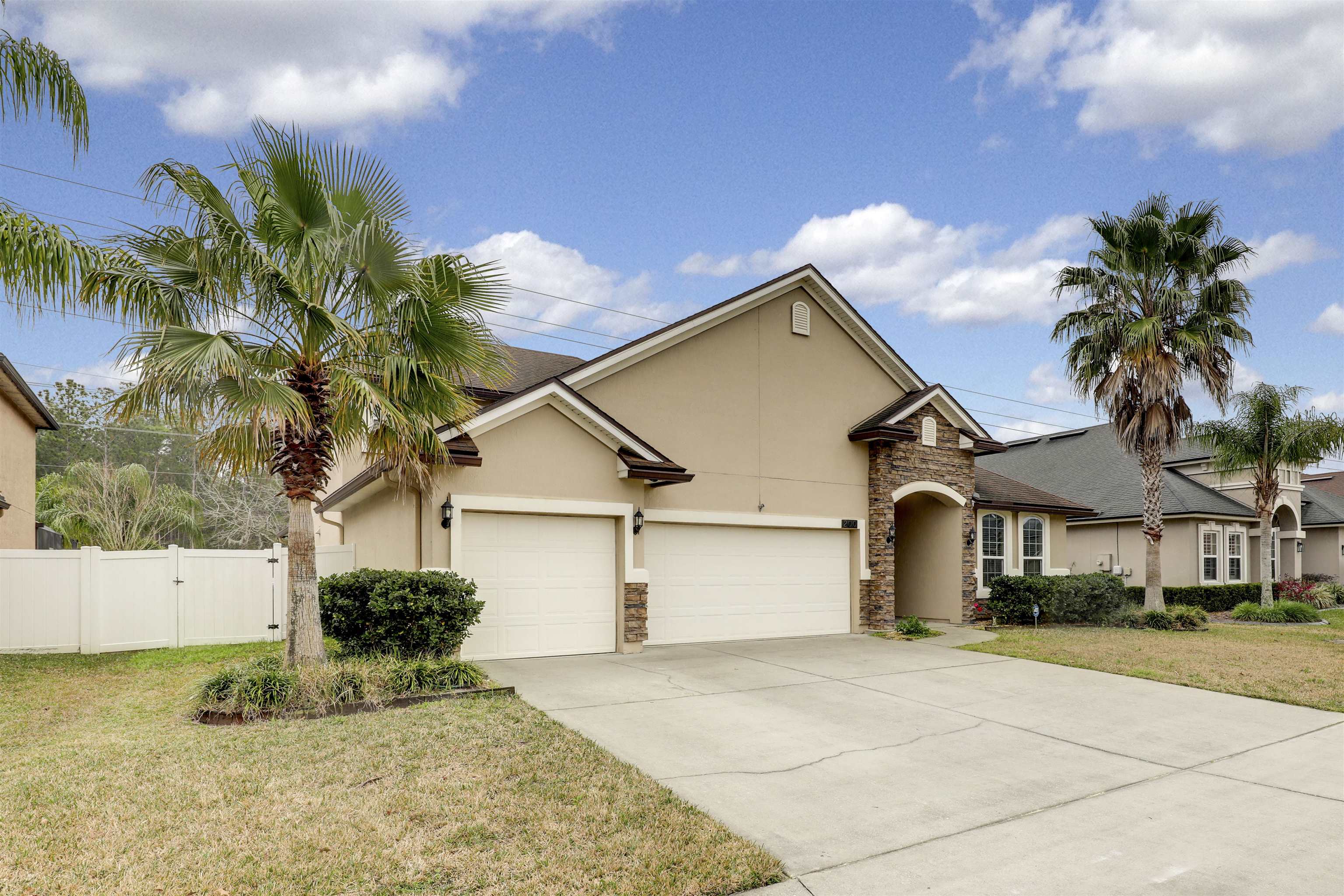 200 Ellsworth Circle St. Johns, FL 32259 - Photo 58 of 58 a front view of a house with a yard and garage