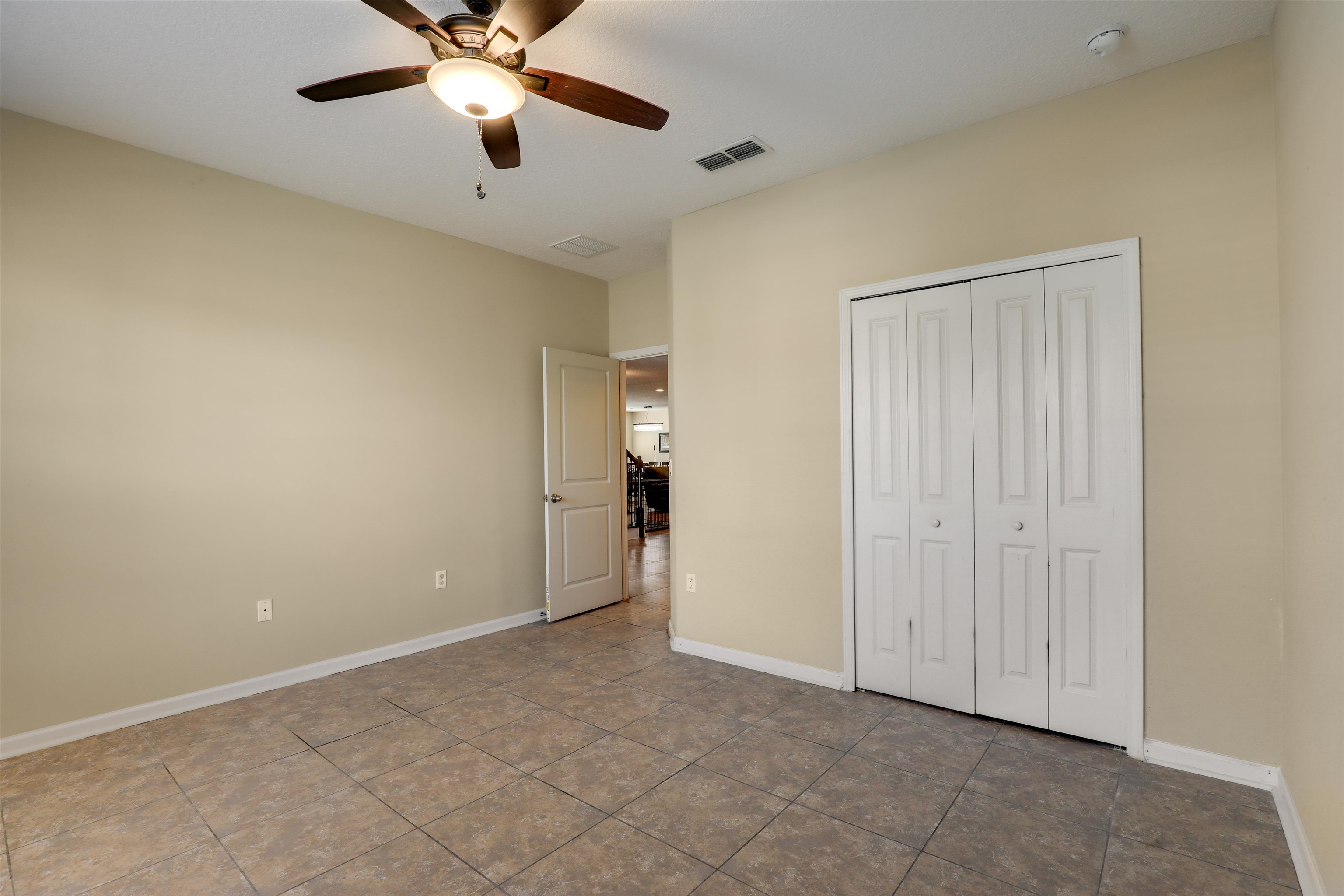200 Ellsworth Circle St. Johns, FL 32259 - Photo 10 of 58 a view of an empty room and chandelier fan