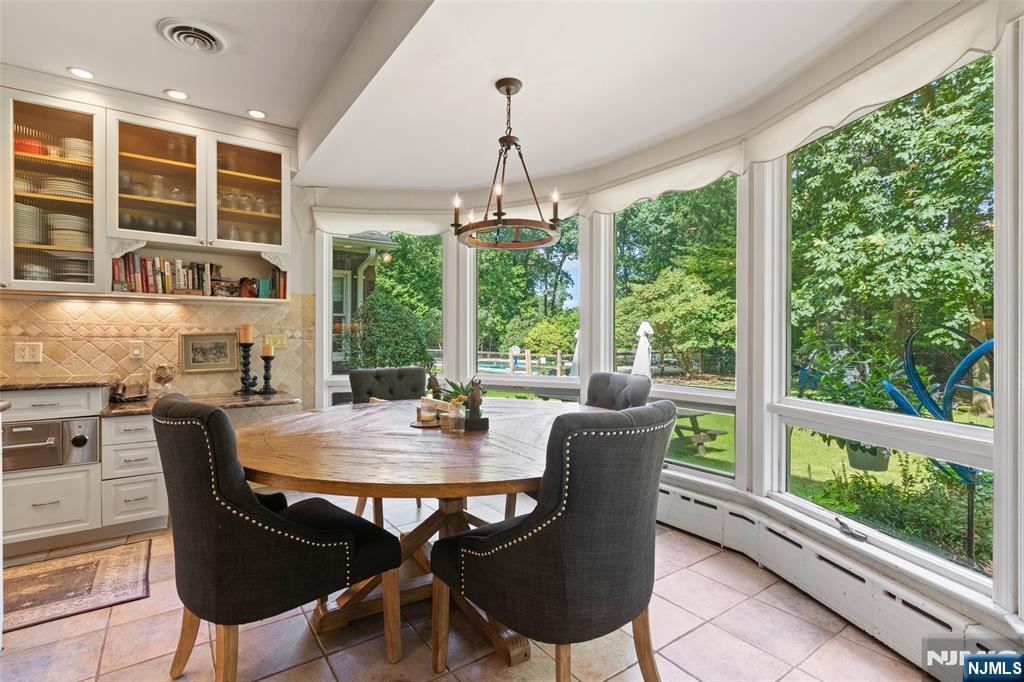 223 Terrace Road Franklin Lakes, NJ 07417 - Photo 12 of 35 a view of a dining room with furniture window and outside view