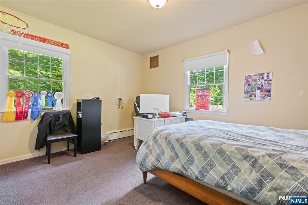 223 Terrace Road Franklin Lakes, NJ 07417 - Photo 19 of 35 a bedroom with a bed and a desk