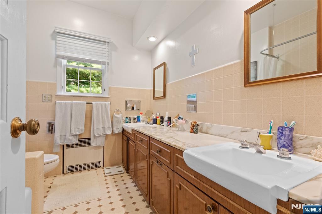 223 Terrace Road Franklin Lakes, NJ 07417 - Photo 20 of 35 a bathroom with a sink and a window