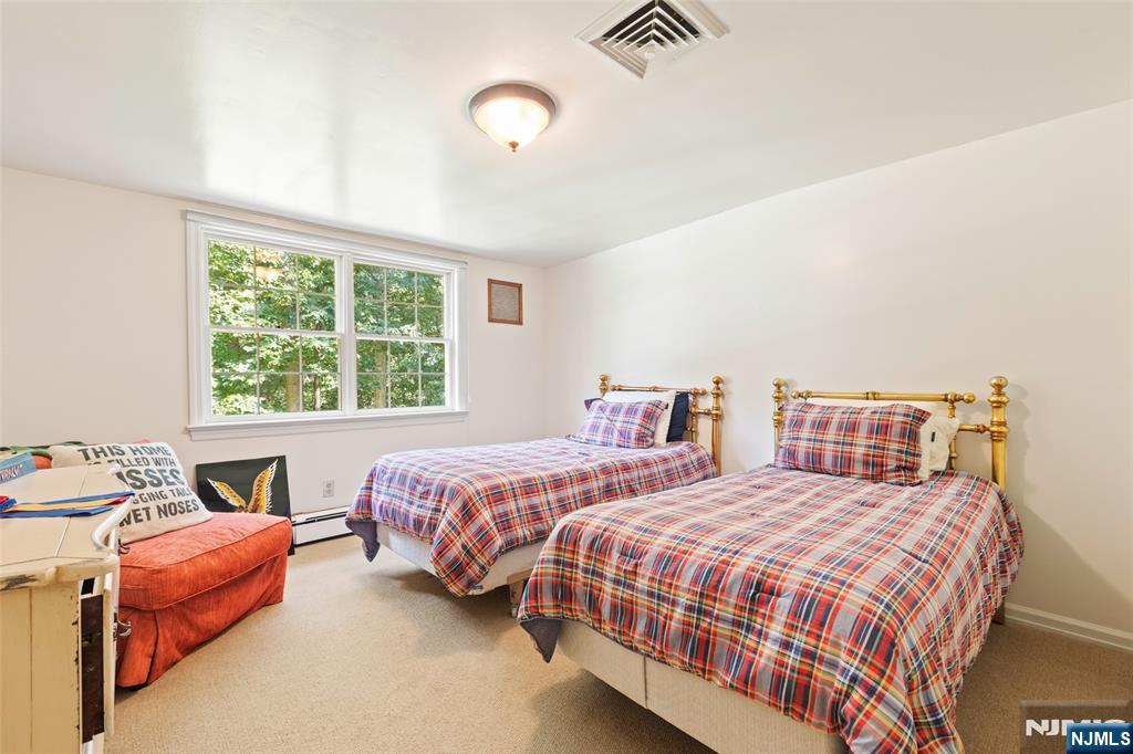 223 Terrace Road Franklin Lakes, NJ 07417 - Photo 21 of 35 a bedroom with two beds and a window