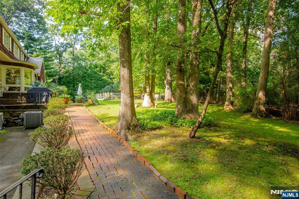 223 Terrace Road Franklin Lakes, NJ 07417 - Photo 29 of 35 a view of a backyard with swimming pool
