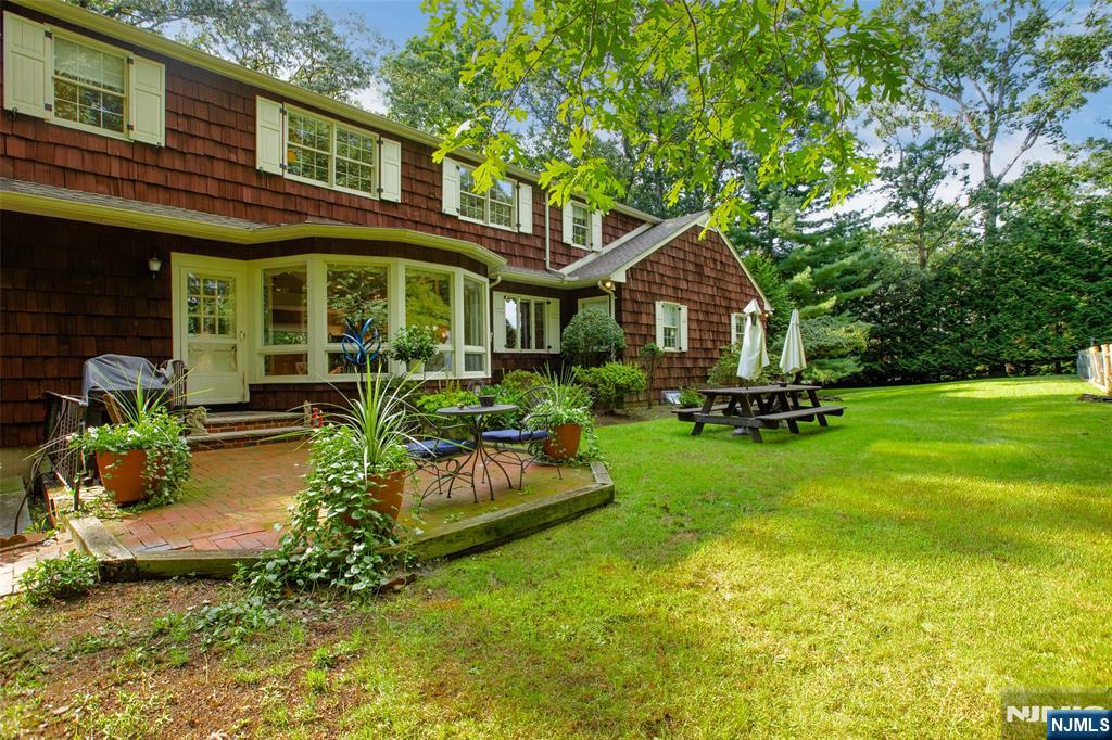223 Terrace Road Franklin Lakes, NJ 07417 - Photo 3 of 35 a front view of a house with garden
