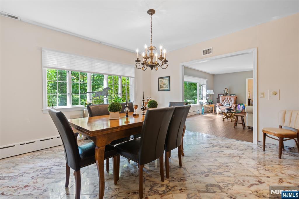 223 Terrace Road Franklin Lakes, NJ 07417 - Photo 6 of 35 a view of a dining room with furniture window and outside view