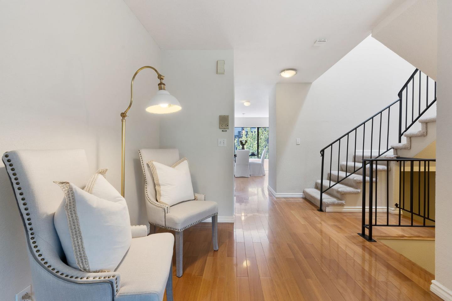 33 Park Road, Unit 13 Burlingame, CA 94010 - Photo 11 of 43 a living room with furniture and a wooden floor