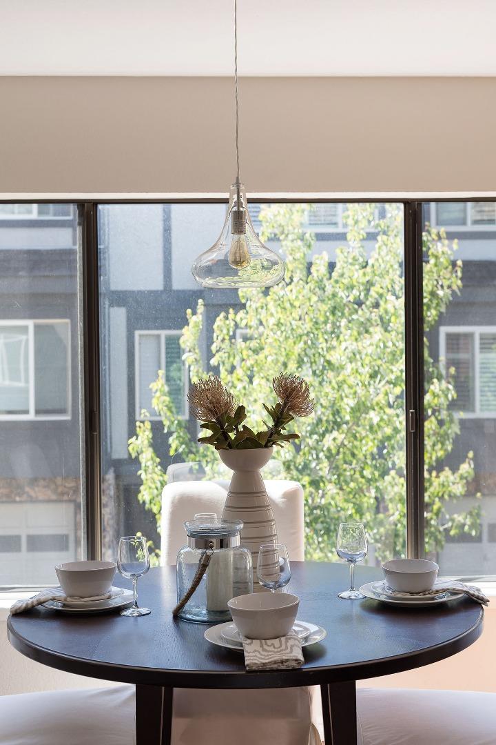 33 Park Road, Unit 13 Burlingame, CA 94010 - Photo 16 of 43 a vase of flowers sitting on a table