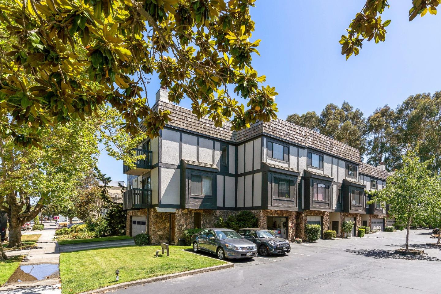 33 Park Road, Unit 13 Burlingame, CA 94010 - Photo 2 of 43 a view of a building with a street view